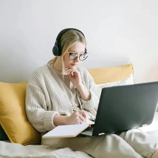 A girl is studying with her laptop