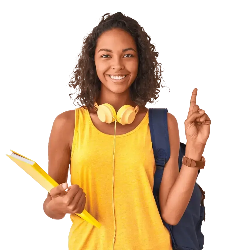 Student is smiling and holding a book